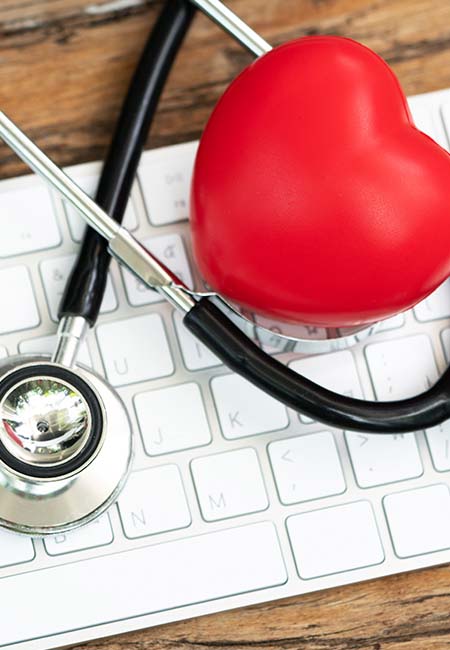 keyboard with stethoscope and heart shape