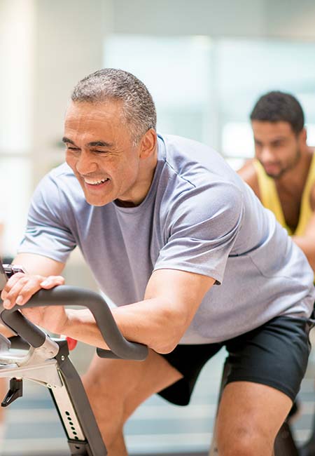 Man on exercise bicycle