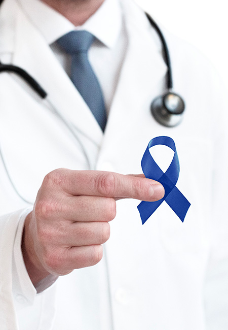 Doctor holding awareness ribbon
