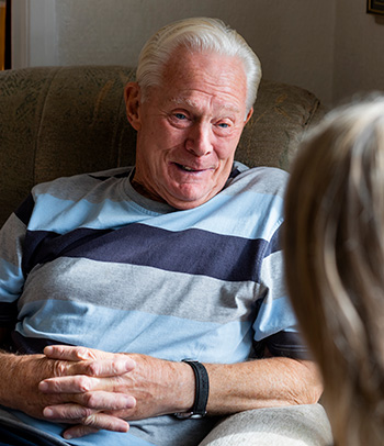 Man talking to caregiver