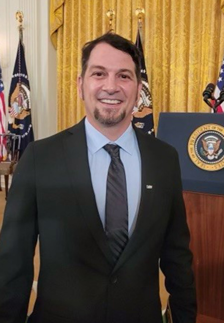 Adam Greathouse PACT Act signing