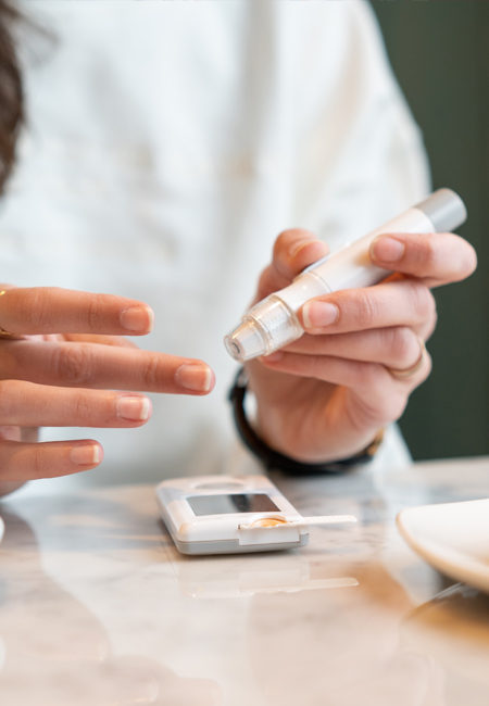 Woman checking her insulin levels