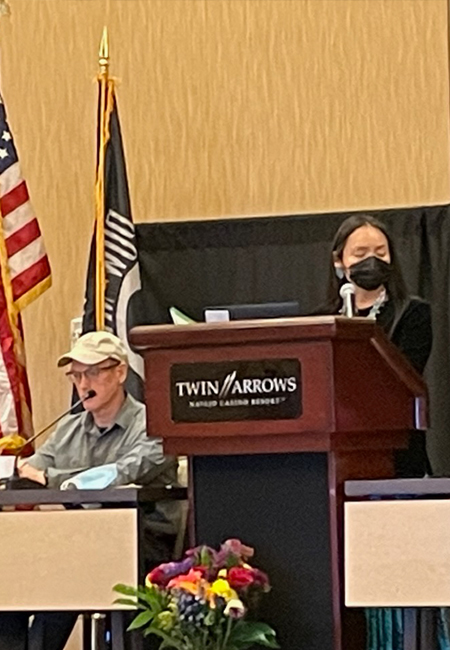 Veterans on stage speaking at the Statewide Tribal Veterans Symposium