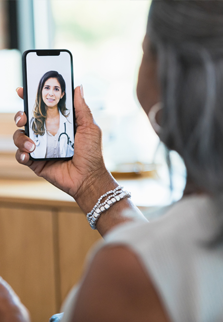 Woman on video call with doctor