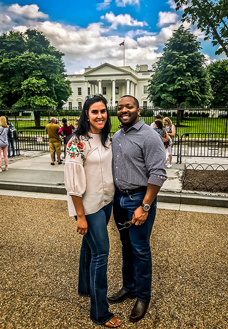 Donny Moncrief and his wife posing outside of the White House