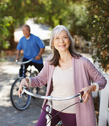 Senior couple riding bicycles.