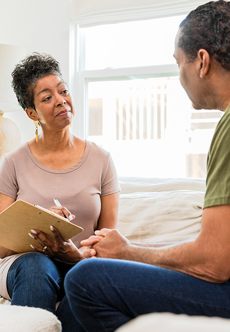 Veteran man meeting with therapist.