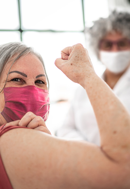 Woman being vaccinated.