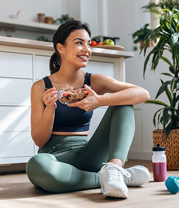 Woman eating healthy and exercising