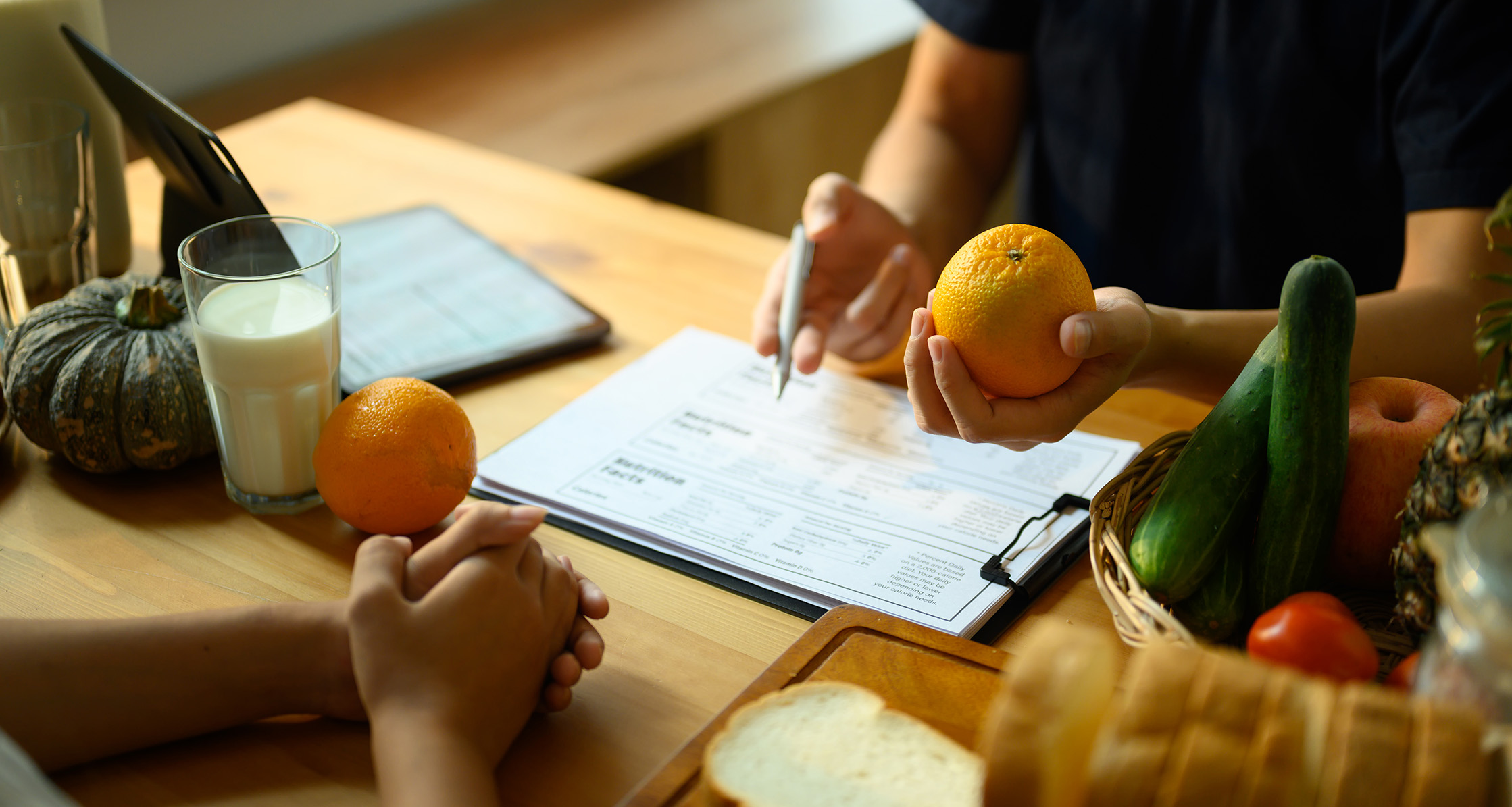 Nutritionist discussing meal plan with patient.