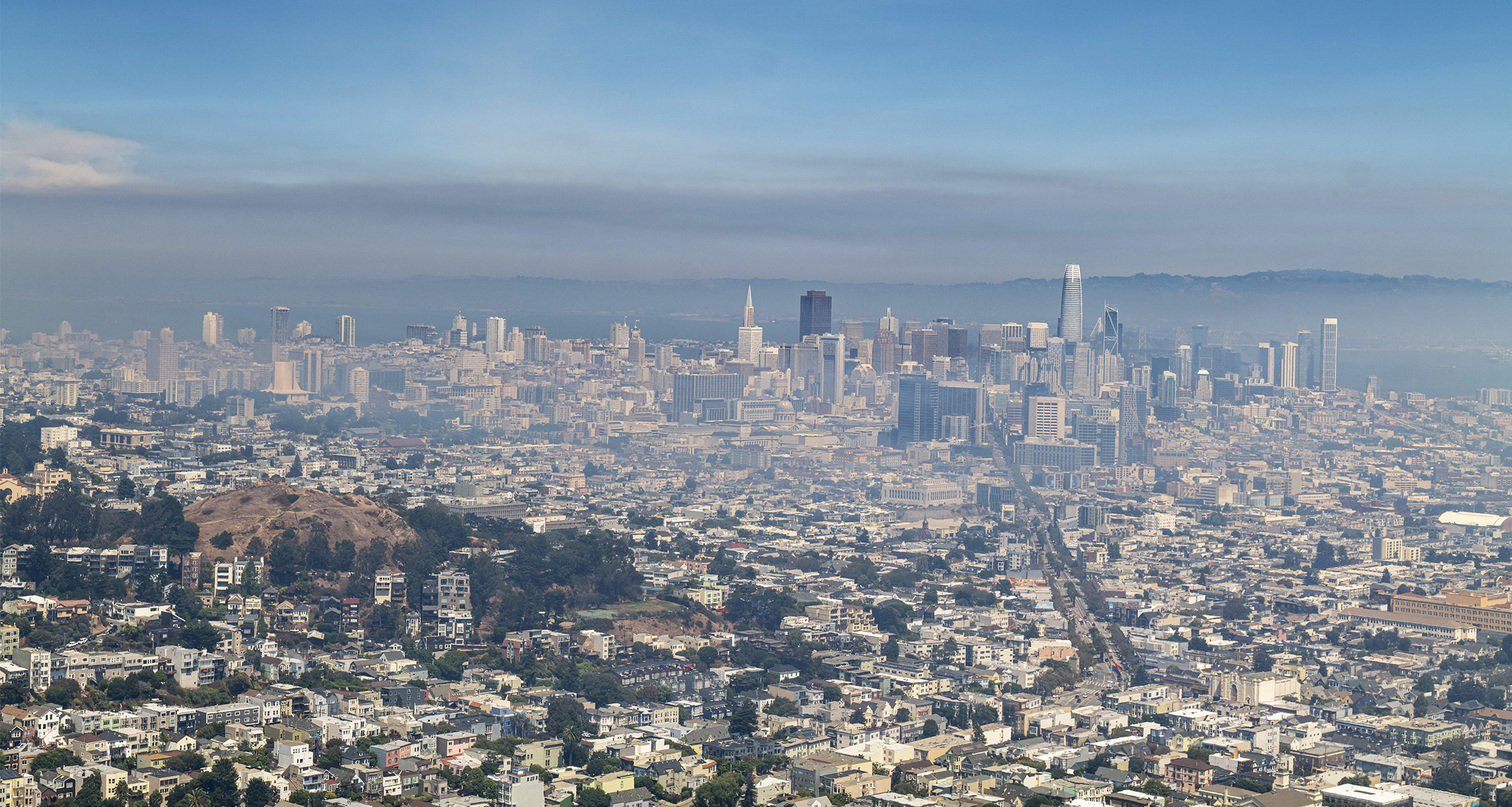 Smoke from wildfires cover buildings on the San Francisco skyline.