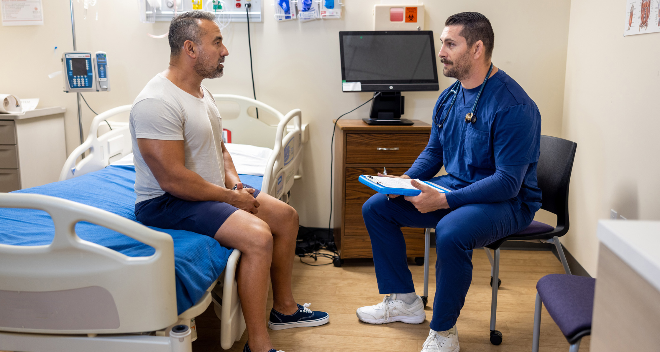 A service member discussing bladder symptoms with a health care provider.