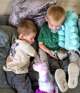 An active-duty Service member video calls her family while deployed to support overseas operations.