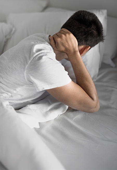 Man with stiff neck pain.