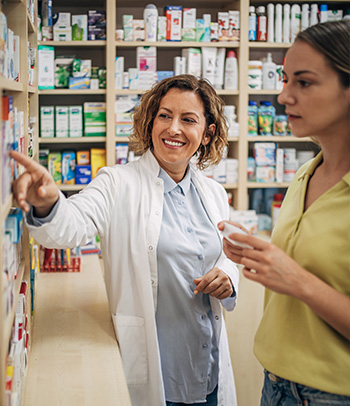 A pharmacist suggesting supplements that won’t interfere with medication.