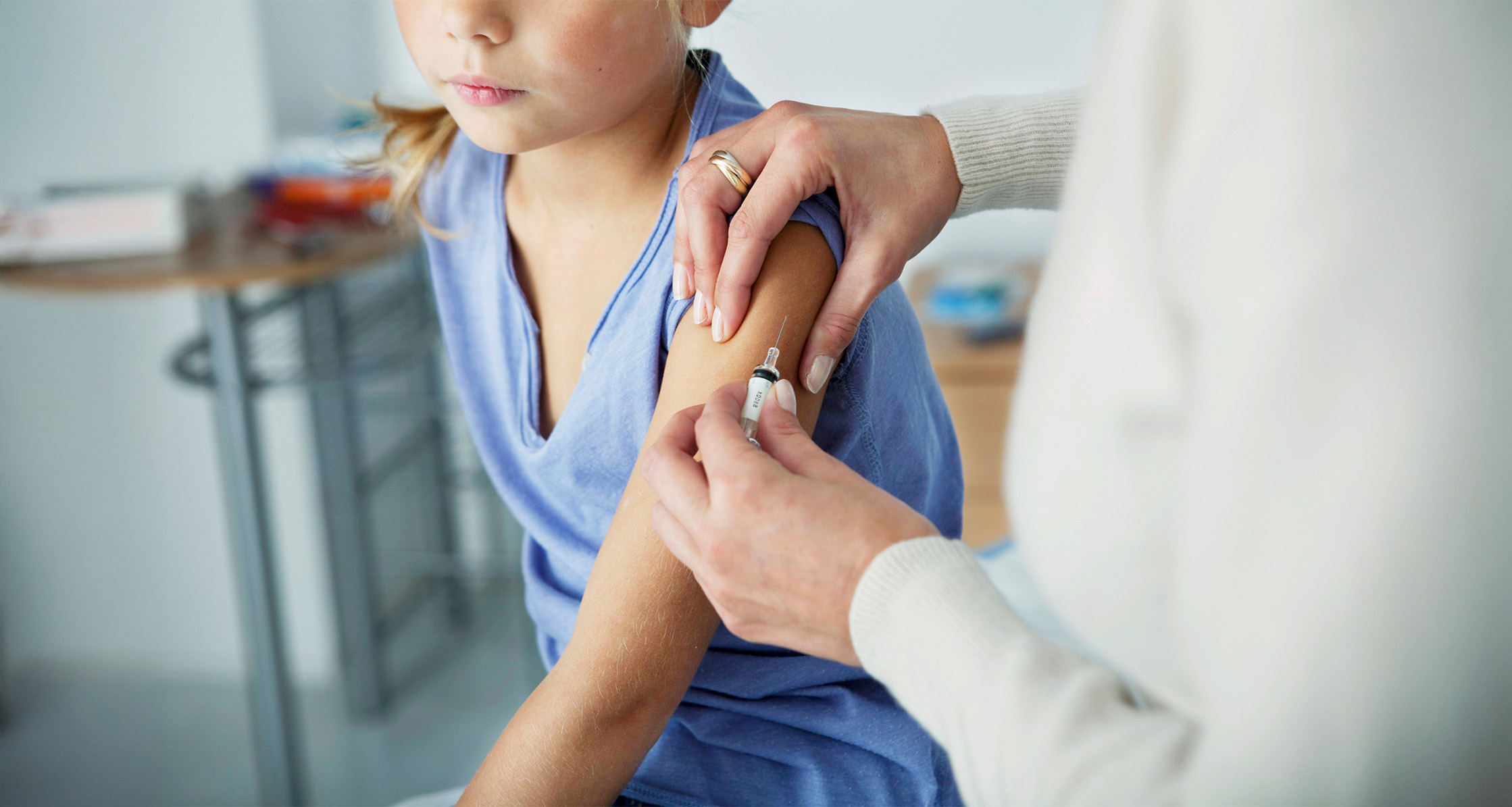 A child getting a measles vaccine.