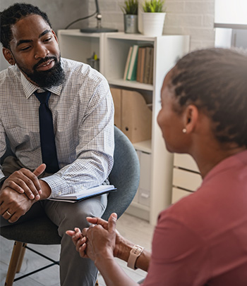 ADHD coach listens to a patient during session