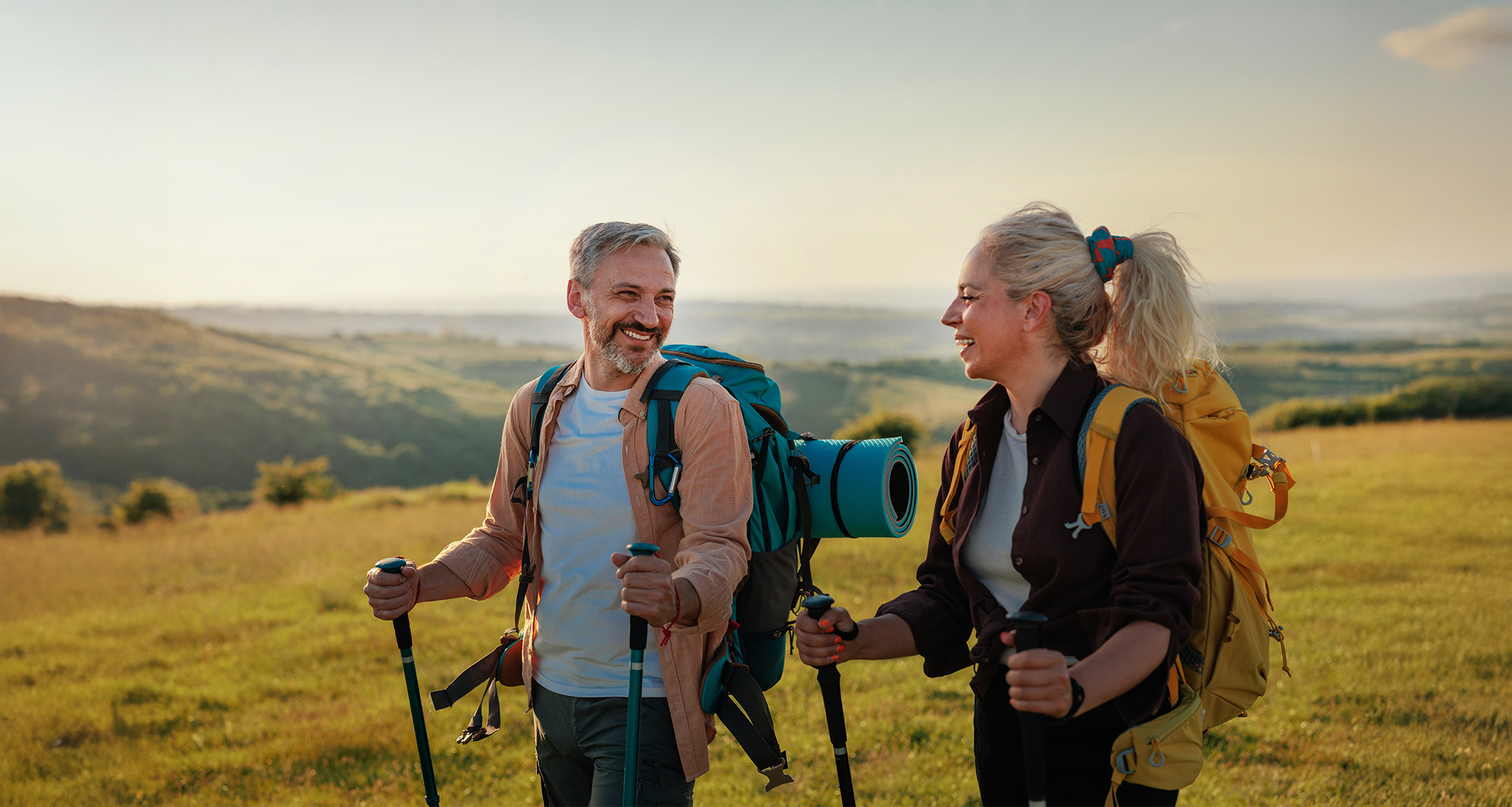 Retired couple hiking as part of a healthy lifestyle.