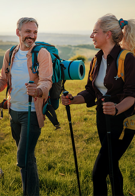 Retired couple hiking as part of a healthy lifestyle.