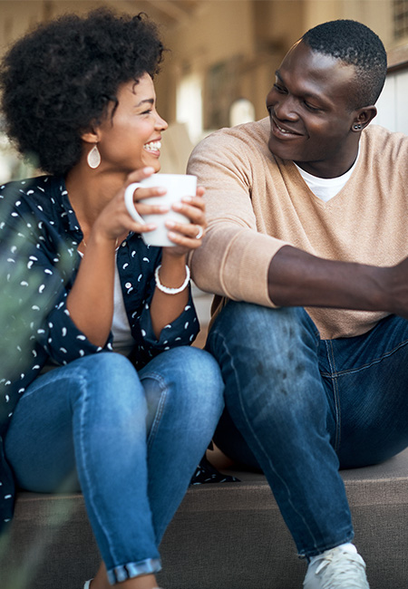 couple talking on front porch