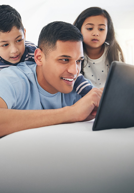 Family using a digital tablet.