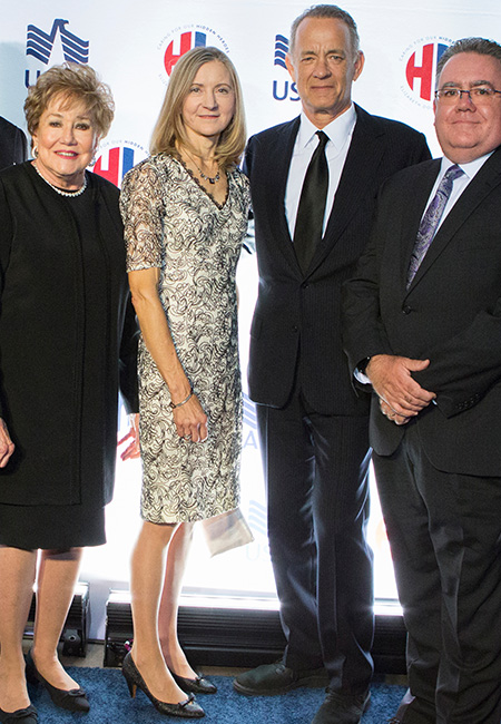 Tom Hanks at Heroes & History Makers program with Elizabeth Doyle and other attendees.