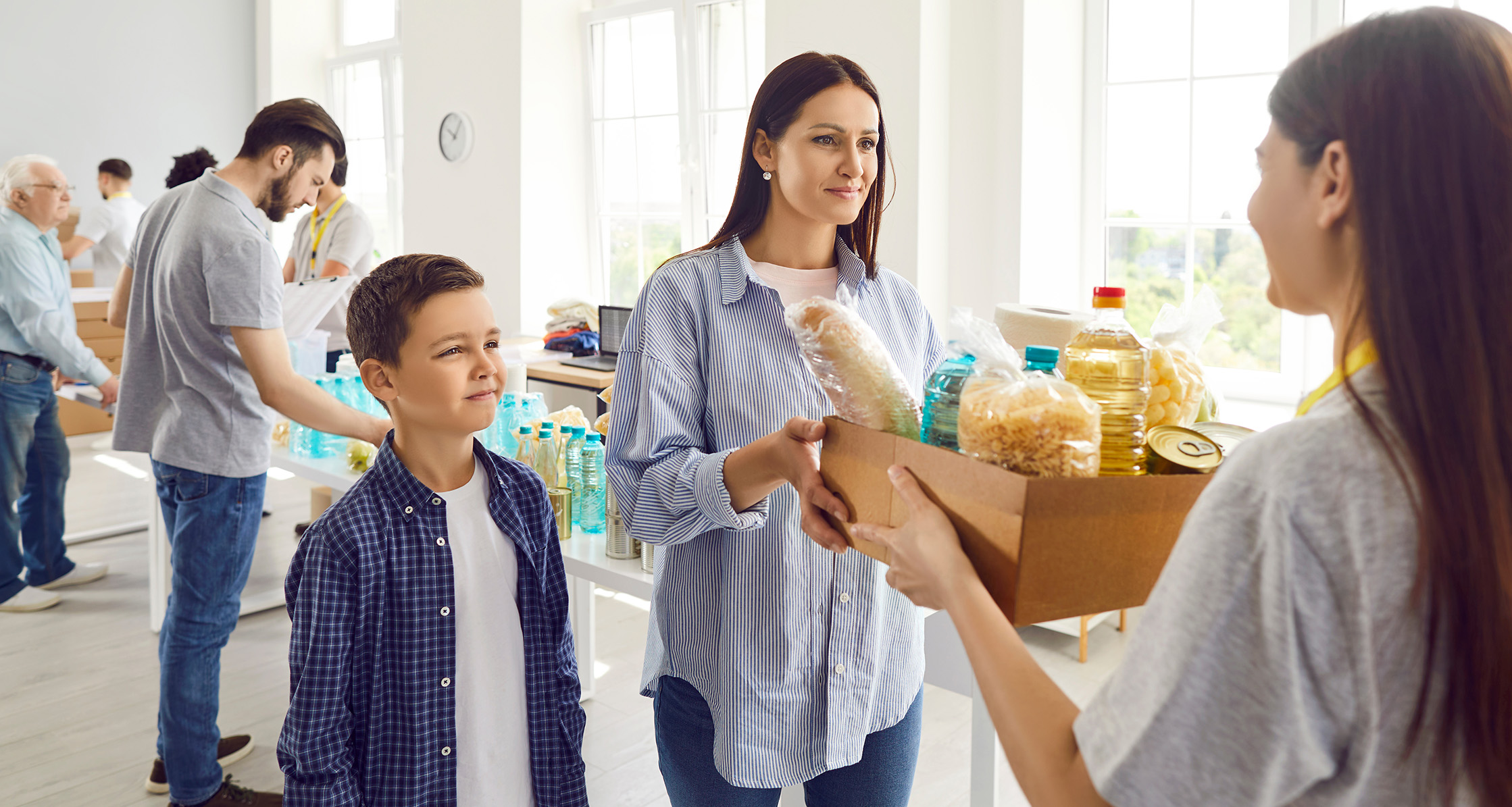 Community food pantry assisting a family.