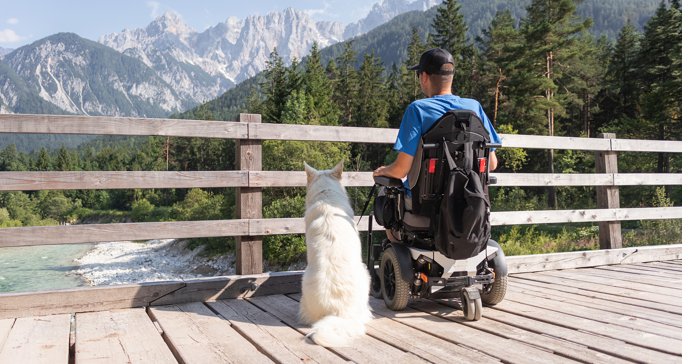 Disabled Veteran spending time outdoors with his dog.
